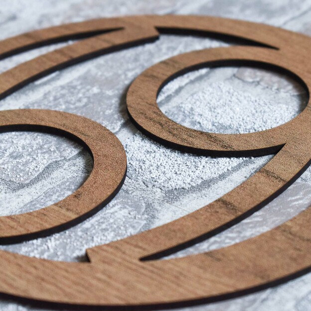 Wooden Symbol on the Wall - Zodiac Sign Cancer