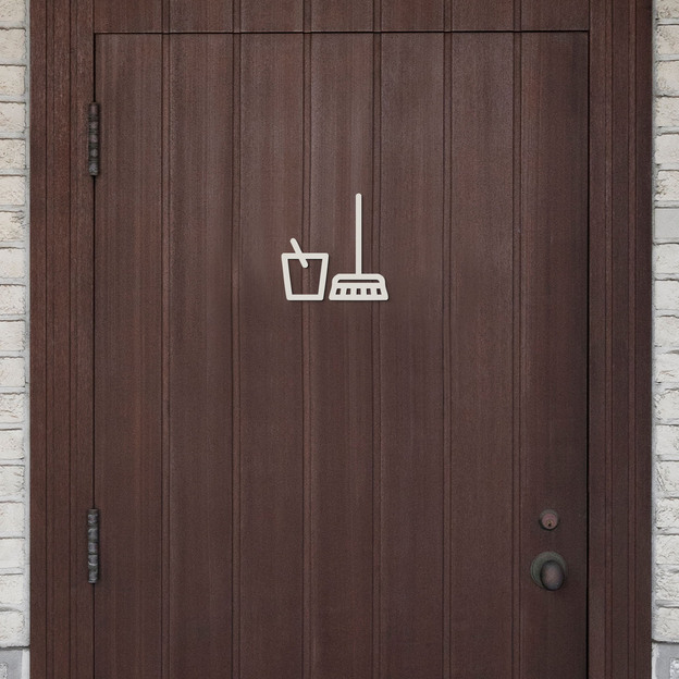 Wooden pictogram on the door - Cleaning room
