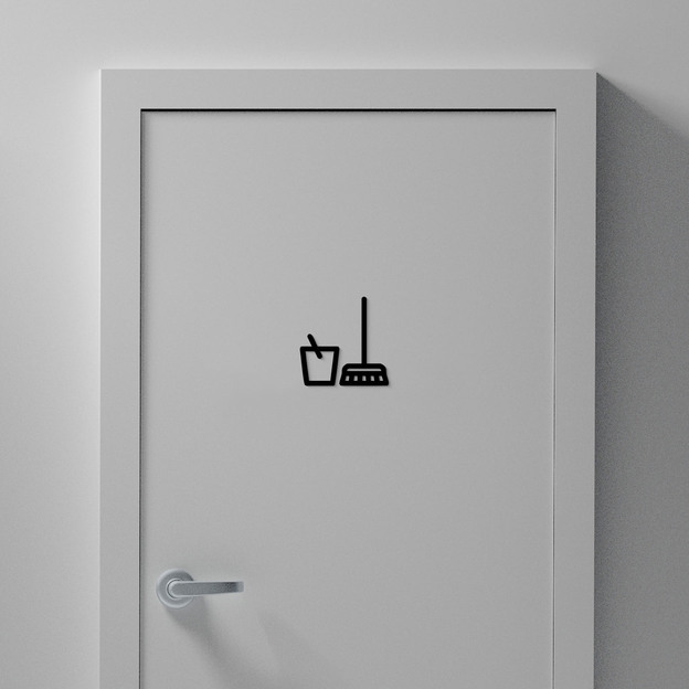 Wooden pictogram on the door - Cleaning room