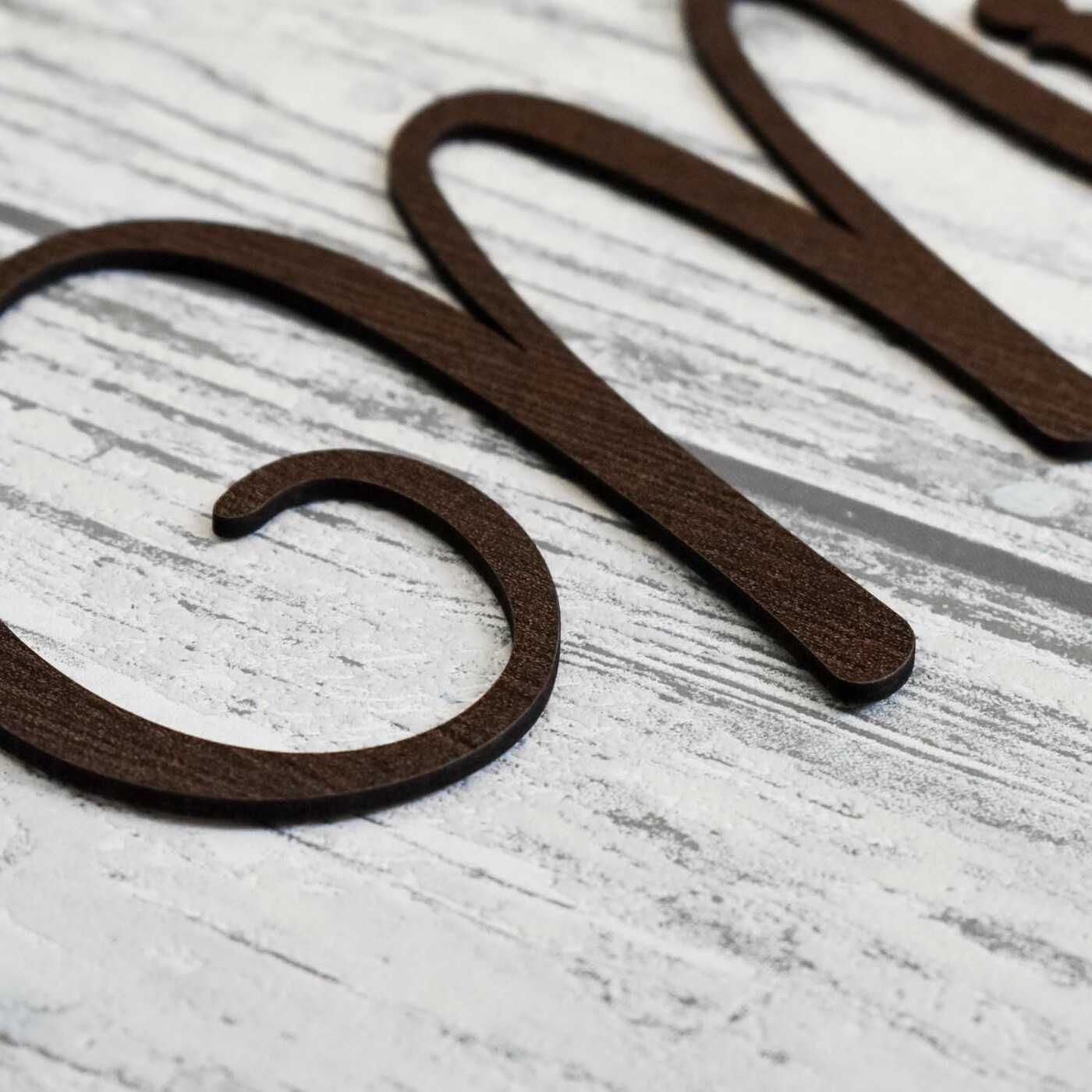 Dřevěná nálepka na zeď - nápis Milujeme se | Wenge