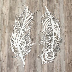 Cut-out Feathers on the Wall made from Wood | White