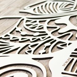 Cut-out Feathers on the Wall made from Wood | White