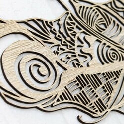 Cut-out Feathers on the Wall made from Wood | Oak Sonoma