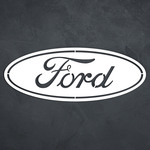 Carved Ford logo on the wall